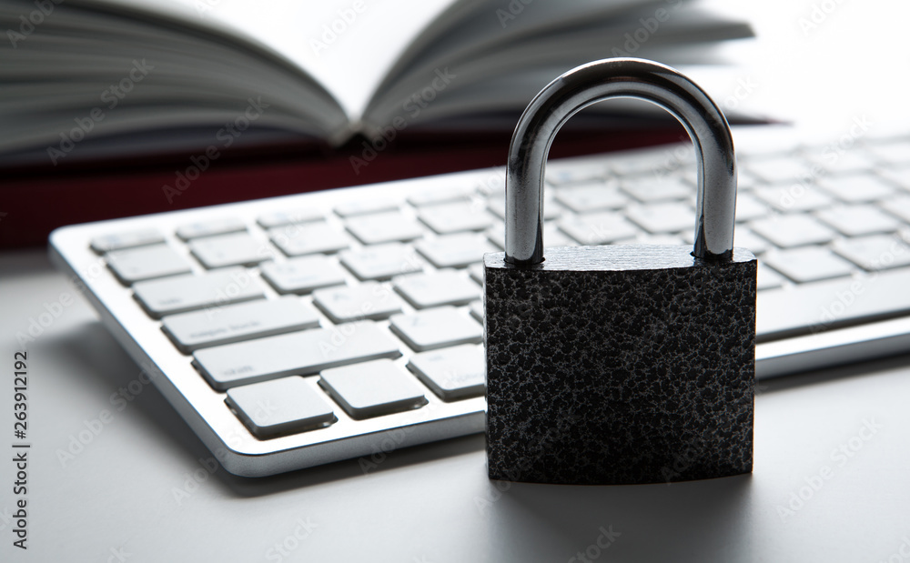 padlock with a computer keyboard Internet security concept padlock with a computer keyboard Internet security concept