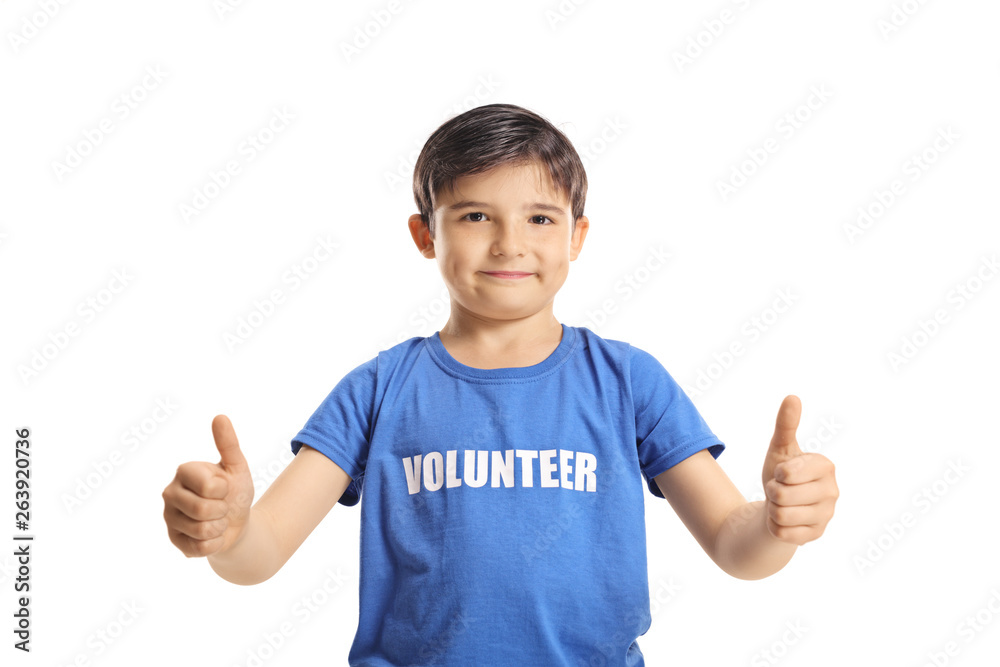 Boy volunteer giving thumbs up and looking at the camera Boy volunteer giving thumbs up and looking at the camera