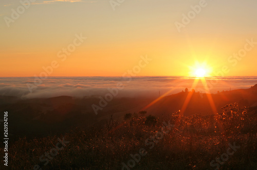 Beautiful Sunset over Windy Hill Open Space and Skyline Boulevard, in California's Bay Area © mtilghma