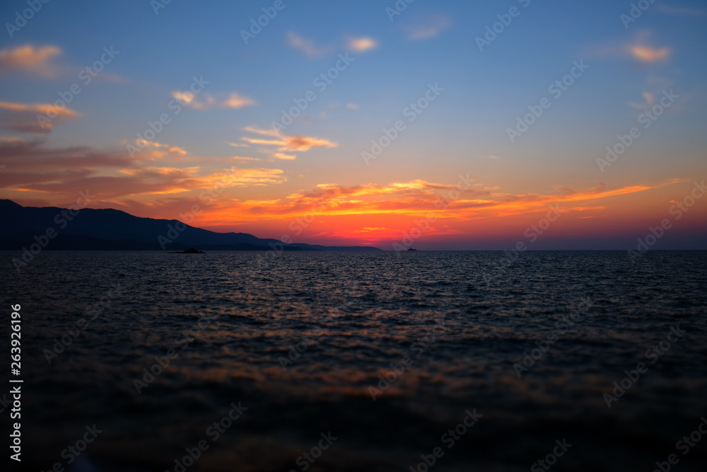 Fototapeta premium Beautiful landscape. Sunset over the sea.