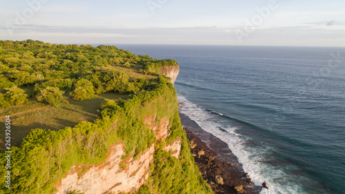 Aerial view over the majestic karang boma cliff overlooking the beautiful ocean of Bali in Indonesia – Image 