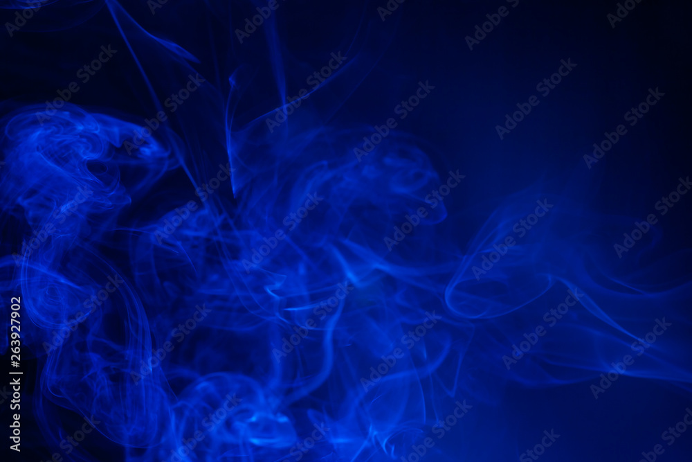 Blue smoke on black background. Blue smoke on black background.