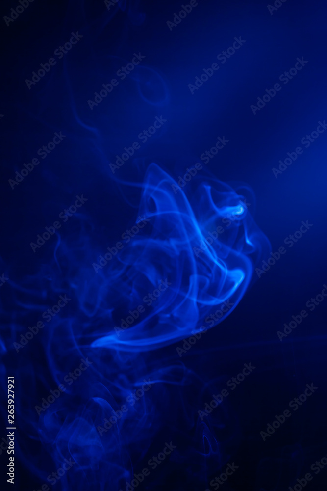 Blue smoke on black background. Blue smoke on black background.