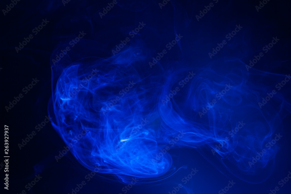 Blue smoke on black background. Blue smoke on black background.
