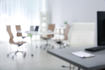 Modern brightly lit office with bokeh effect