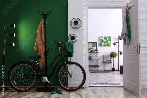 Stylish hallway with modern bicycle. Idea for interior decor photo