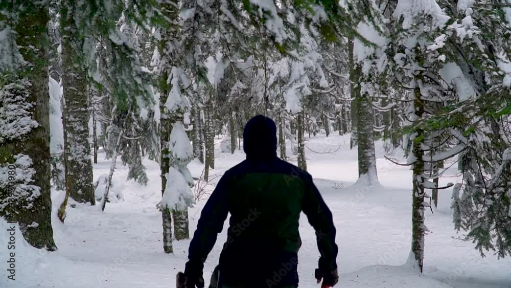 camper man walking in snowy forest to make discovery / Bolu in Turkey camper man walking in snowy forest to make discovery / Bolu in Turkey