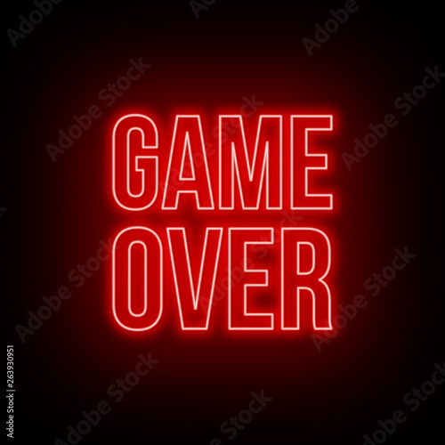 Neon game over green sign on dark background.