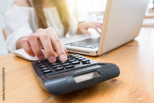 businesswoman hand working with finances