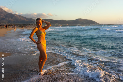 The girl on the beach Falasarna in Crete