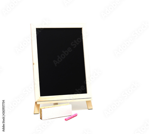 empty blackboard and colored chalks and brush removes the board on white background