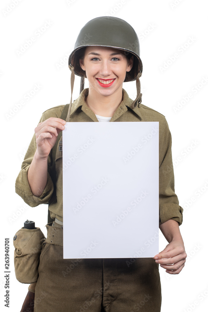young woman dressed in American ww2 military uniform showing empty blank signboard young woman dressed in American ww2 military uniform showing empty blank signboard