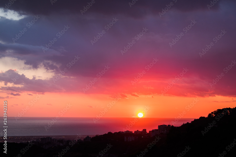 This is a capture of a sunset in Beirut and you can see the orange color formed by the sun and the beautiful horizon