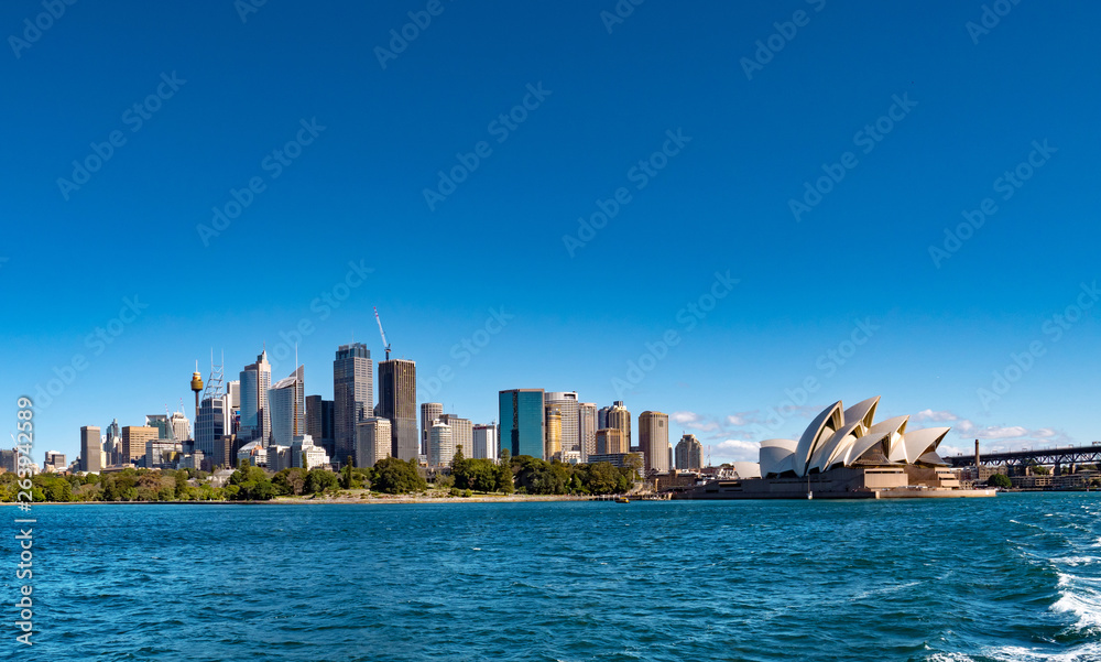 Sydney city skyline and Opera House as seen from the sea