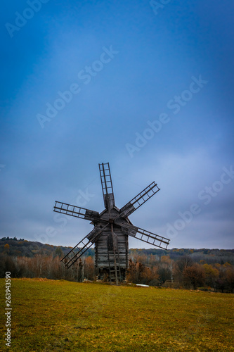 windmill in a field at autumn