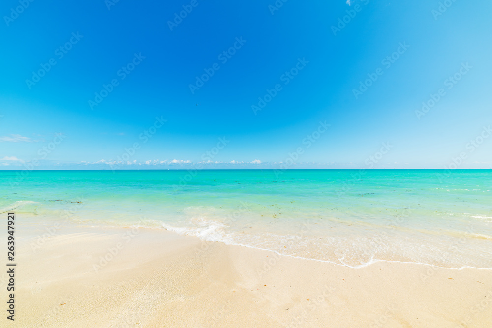 Blue sky over turquoise water in Miami Beach shore