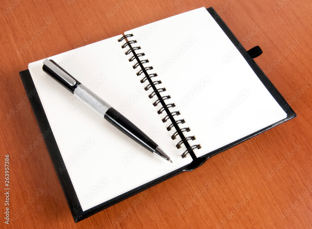 Notebook and pen Notebook and pen