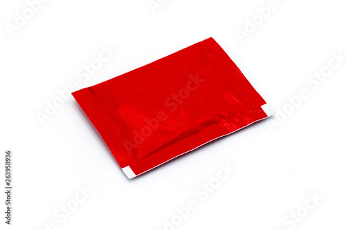 Empty red sugar Sachet isolated on white background 