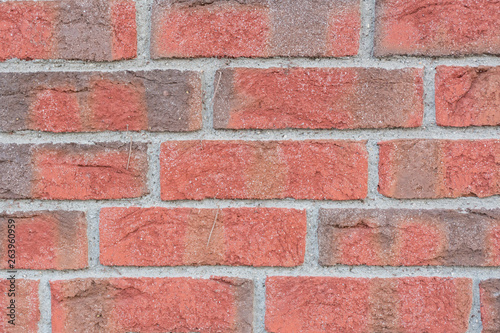 Close up of red and grey brick wall