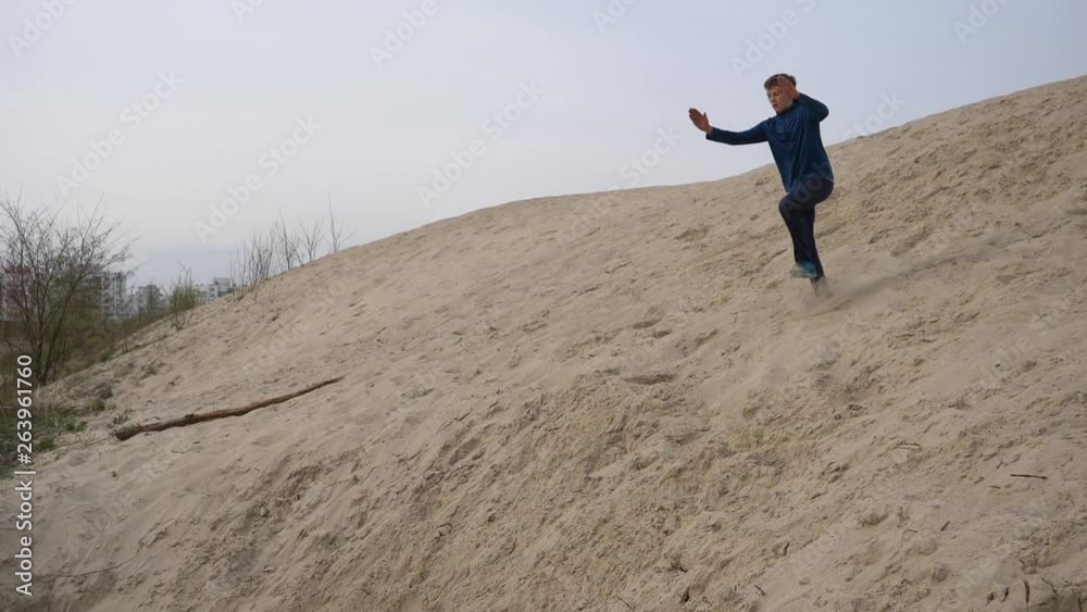 Children and teenagers have fun on the white sand. parkour Children and teenagers have fun on the white sand. parkour