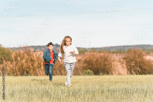 Kids playing in countryside