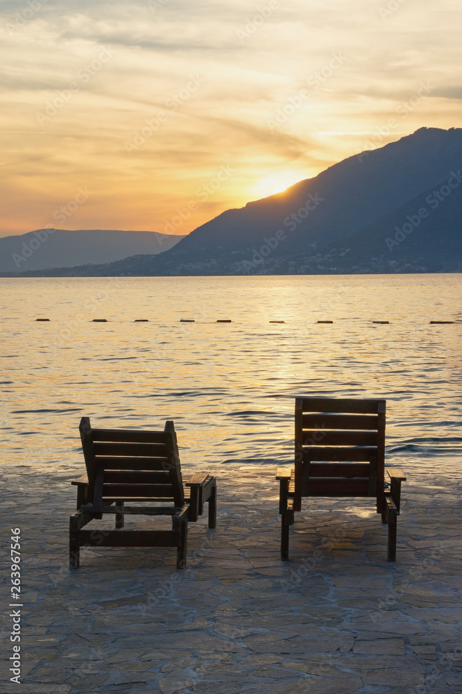 Beach vacation. Montenegro, Adriatic Sea, view of Bay of Kotor near Tivat city Beach vacation. Montenegro, Adriatic Sea, view of Bay of Kotor near Tivat city
