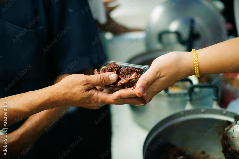 The Society of Sharing Food to Homeless and the Poorest: The Concept of Feeding : The hands of the rich give food to the hands of the poor The Society of Sharing Food to Homeless and the Poorest: The Concept of Feeding : The hands of the rich give food to the hands of the poor