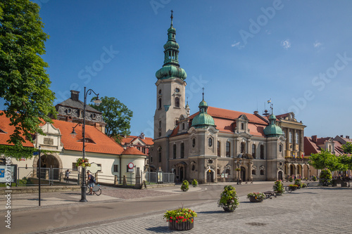 Church and town hall in Pszczyna, Silesia, Poland