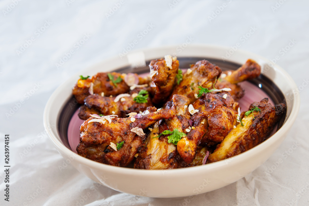 Chicken Wings Spicy chicken wings, breaded, fried, cooked. Chicken Wings Spicy chicken wings, breaded, fried, cooked.