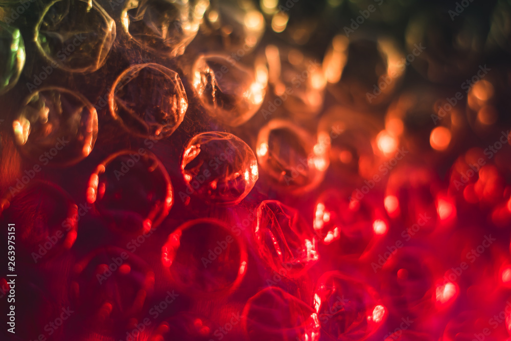 texture red cellophane with air bubbles, abstract, macro texture red cellophane with air bubbles, abstract, macro