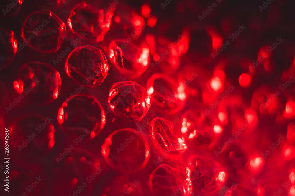 texture red cellophane with air bubbles, abstract, macro texture red cellophane with air bubbles, abstract, macro
