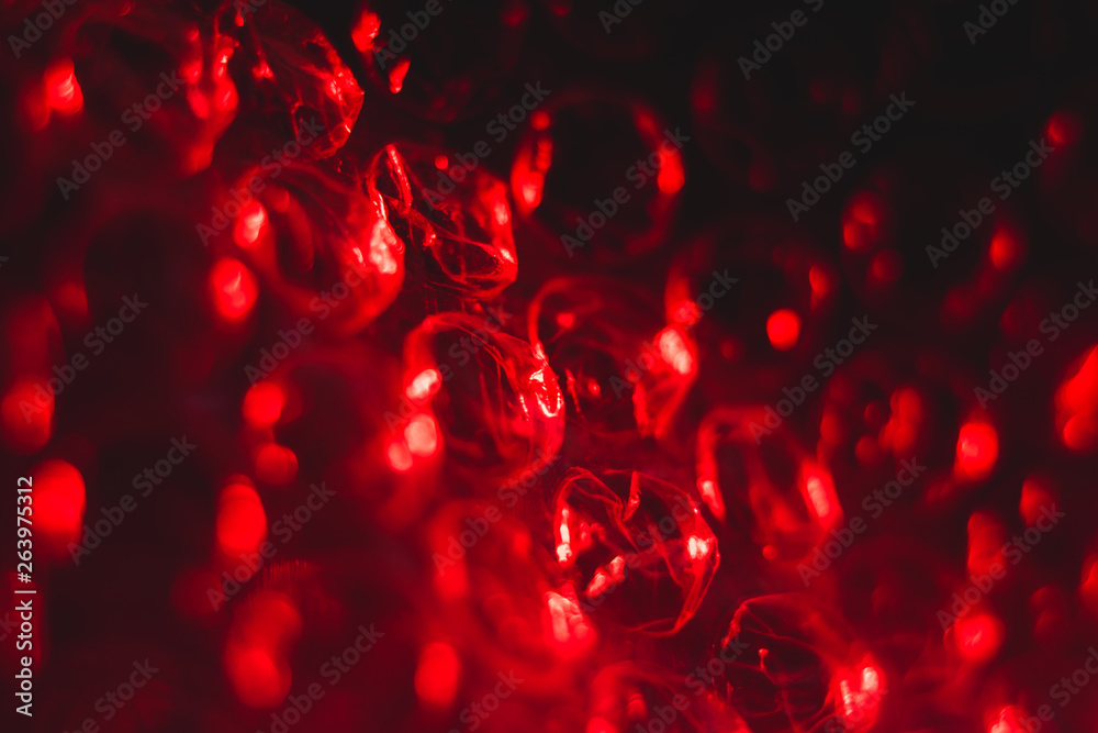 texture red cellophane with air bubbles, abstract, macro texture red cellophane with air bubbles, abstract, macro