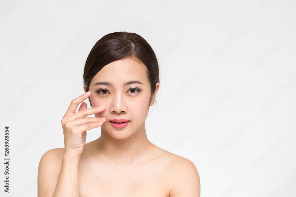Beautiful young Asian woman with clean fresh skin, Girl beauty face care, Facial treatment and cosmetology spa concept Beautiful young Asian woman with clean fresh skin, Girl beauty face care, Facial treatment and cosmetology spa concept