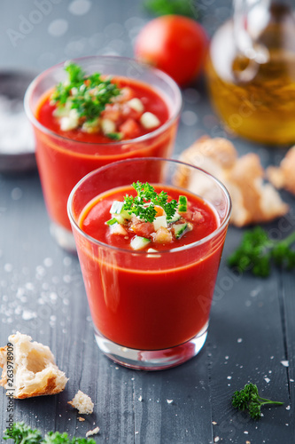 Tasty summer tomato soup served in glass