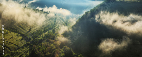 picturesque autumn morning. foggy sunrise over river canyon © sergnester
