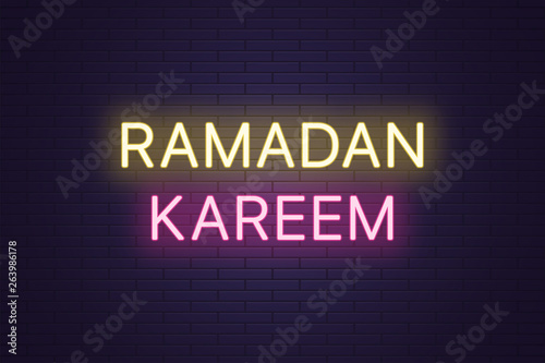 Neon composition of headline Ramadan Kareem. Text