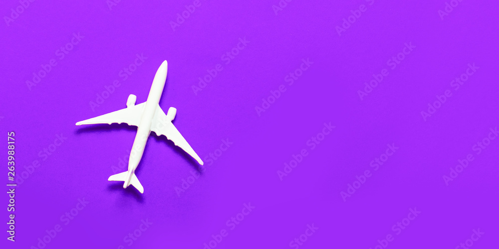 Model plane, airplane on pastel color background.