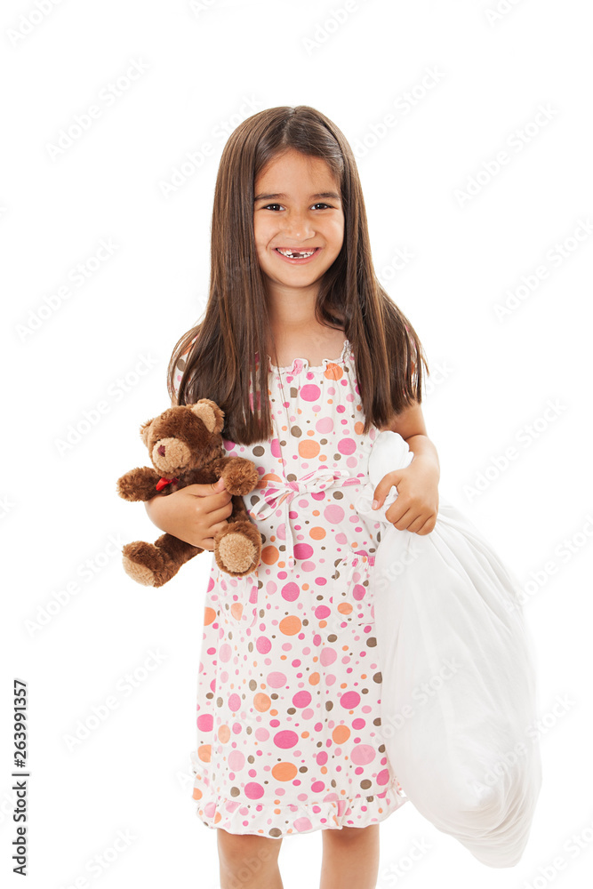 Girl with pillow and soft teddy in hand, intends to go to bed. Isolated on white background. Girl with pillow and soft teddy in hand, intends to go to bed. Isolated on white background.