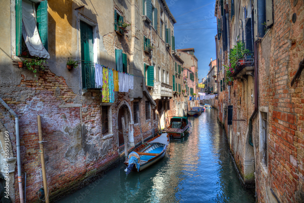 Historical houses on a canal in the old part of Venice, Italy