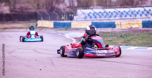 Junior Go Kart Racers on Track © VlaDee