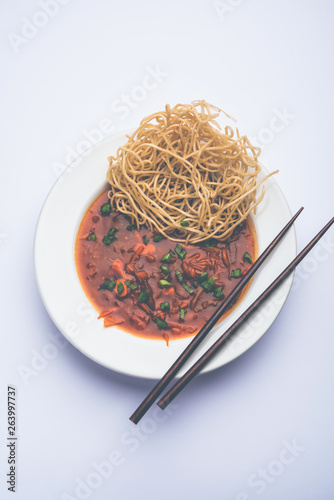 American chop suey/ chopsuey is a popular indochinese food. served in a bowl with chop sticks. selective focus photo