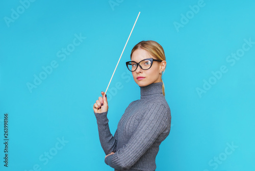 Image on side of woman teacher with pointer
