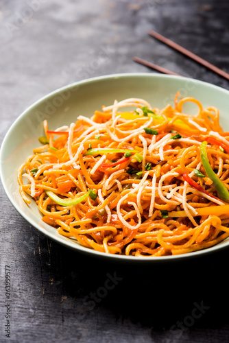 American chop suey/ chopsuey is a popular indochinese food. served in a bowl with chop sticks. selective focus photo