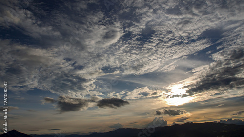 The dramatic and beautiful sunset over the Tomine reservoir in the Andean mountains of central Colombia. photo