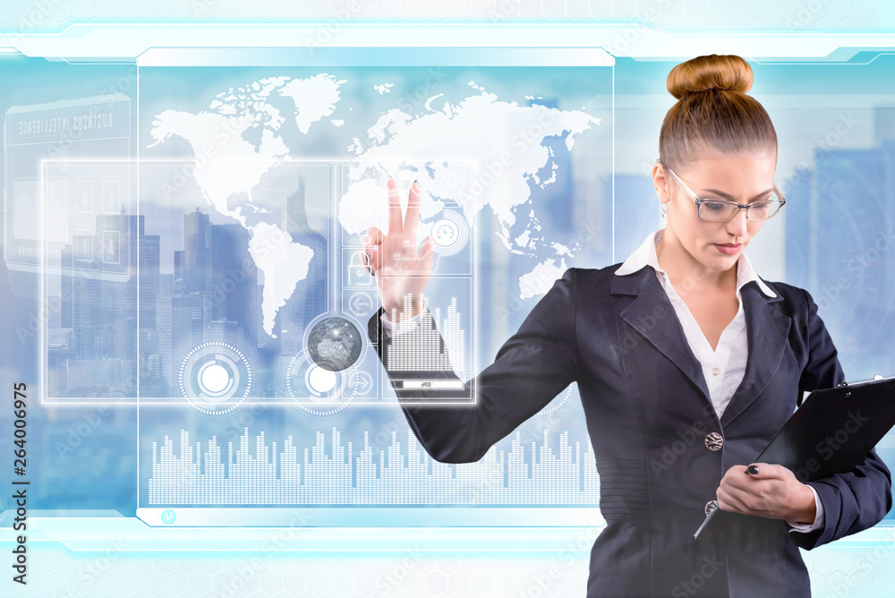 Young business lady works with virtual graphic interface in futuristic office Young business lady works with virtual graphic interface in futuristic office