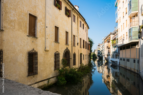apartments along canal in Padua, Italy © Corinne