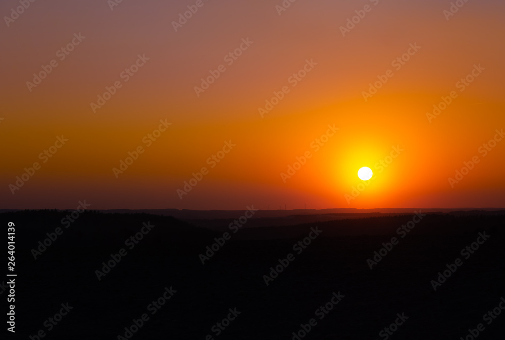 orange sunset on the horizon