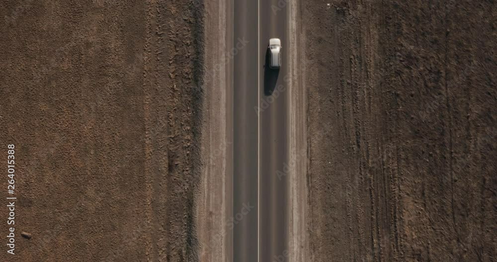 Two car driving on empty highway at spring time / Aerial drone top down view Two car driving on empty highway at spring time / Aerial drone top down view