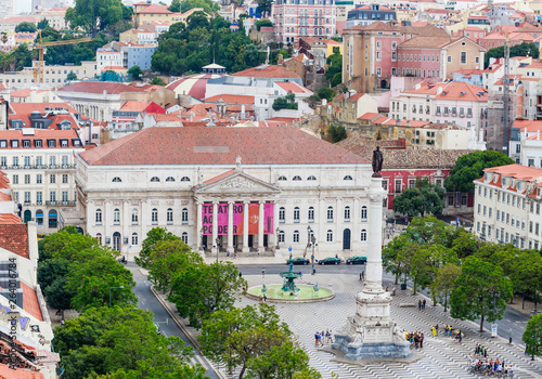 View of  Statue of Portugal's King Dom Pedro IV and  Dona Maria II national theatre from the elevator de santa justa or santa just a lift . Rossio Square, Baixa district, Lisbon, Portugal
