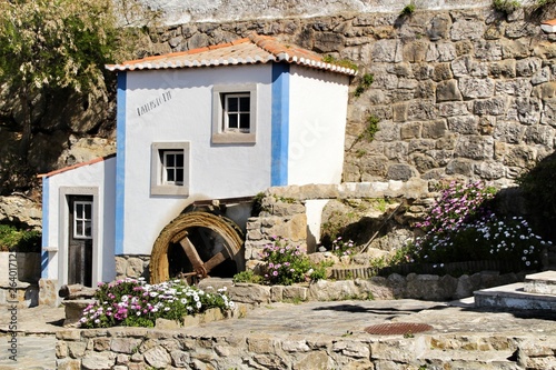 Beautiful waterwheel in Azenhas do Mar in Portugal photo
